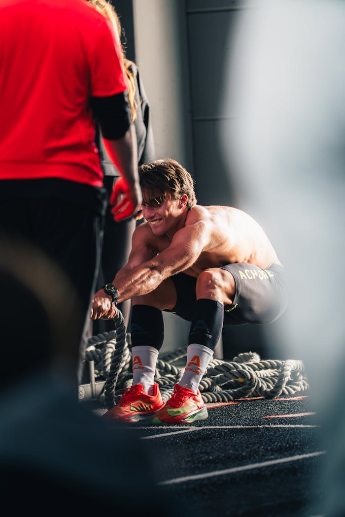 Young man performing an outdoor CrossFit workout in Hamburg, Germany, showcasing strength and dedication.